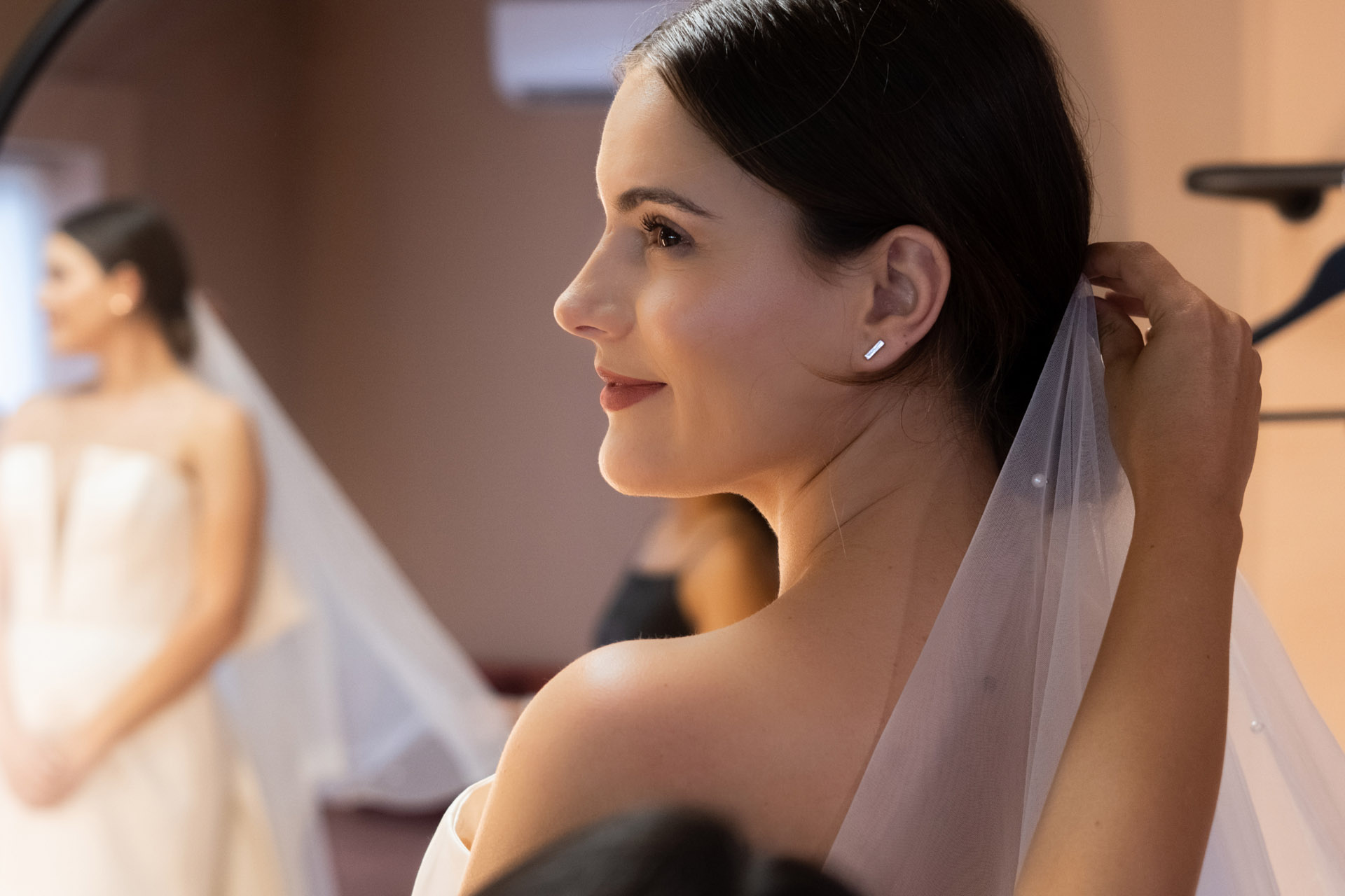 A bride at her wedding with glowing skin
